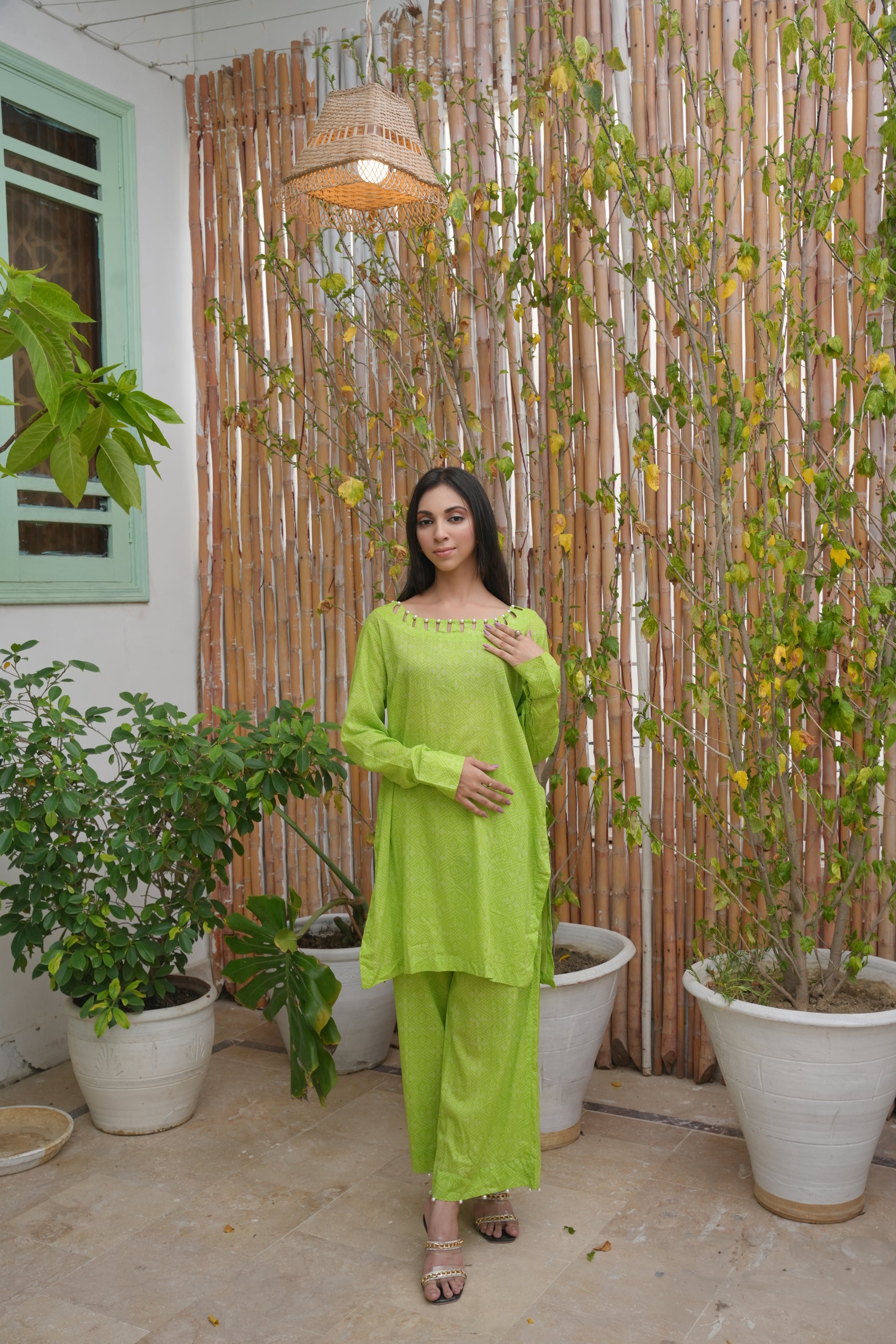 Printed Green Elegance: Kurta & Trouser Set with Unique Neckline pearl Detailing
