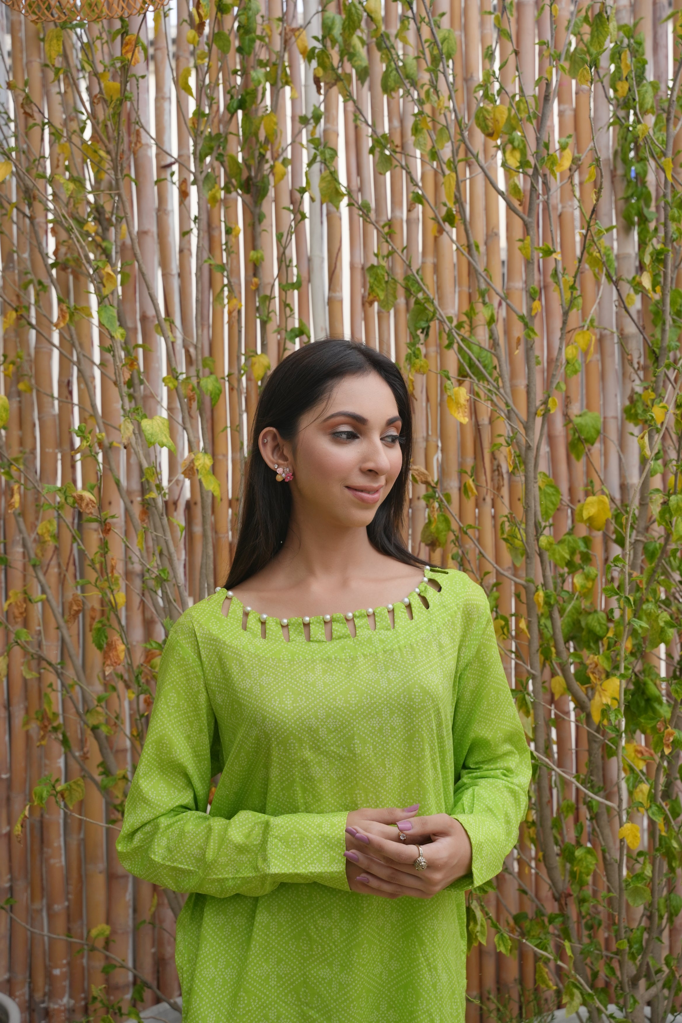 Printed Green Elegance: Kurta & Trouser Set with Unique Neckline pearl Detailing